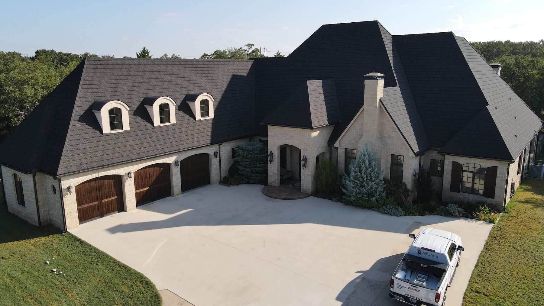 Stone-coated steel roof installed by Alliance Metal Roofing on a North Texas home